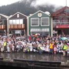Hundreds gathered on Steamer Wharf and around Queenstown Bay to welcome  TSS Earnslaw to its home...