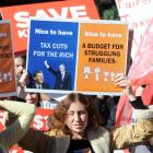 Hundreds of public service workers protested funding cuts at Parliament, in Wellington, today....