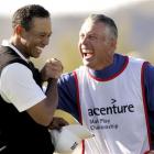 In this 2008 AP file photo, Tiger Woods, left, and caddie Steve Williams celebrate Woods' win...