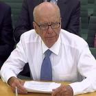 In this image made from television, Rupert Murdoch, following an attempted assault, gives...