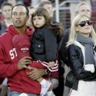 In this November 21, 2009 AP file photo, Tiger Woods is pictured with his daughter Sam and wife...