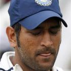 India captain MS Dhoni reacts after his team's loss to England in the third test at Edgbaston in...