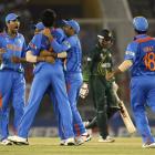 India's players celebrate the dismissal of Pakistan's Abdul Razzaq, second from right, during the...