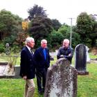 Inspecting war graves at Warringtons St Barnabas Church are (from left)  Commonwealth War Graves...