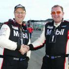 Invercargill's Scott O'Donnell (left) shakes hands with driving partner Allan Dippie, of Dunedin,...