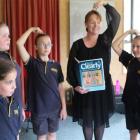 Invercargill speech teacher Miriam Erikson practises a posture exercise with a class at her...