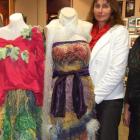 Irene Smith with one of the prize-winning WoolOn garments  displayed at Central Stories. Photo by...