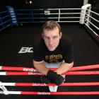 Irish boxer Martin Rogan relaxes in the ring. He is preparing for the Super 8 tournament on...