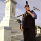 Lest we forget . . . Dunback resident Ivan Ross pays tribute  at the local war memorial  every...
