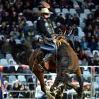 Jackson Laurie, of New South Wales, displays his skill during the saddle bronc. Photo by Stephen...