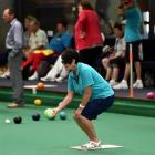 Jacqui O’Brien, from New South Wales, lines up a bowl during a cruise ship challenge match at the...