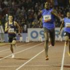 Jamaican sprinter Usain Bolt competes to win the men's 300 meters race at the IAAF World...