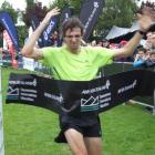 James Parsons, of Palmerston North, crosses the finish line to win the men's section of the...