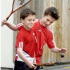 Jamie (left) and Josh Oakley joke around ahead of their opening matches in the E grade national...