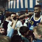 Jerome Fitchett celebrates with Nuggets fans. Photo from <i>ODT</i> Files.