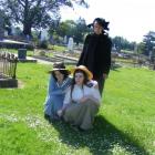 Jess Ransom, Alya McLean and Carol Krueger at Minnie Dean's unmarked grave at Winton Cemetery.