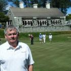 Jim Clelland, national events manager for the PGA of New Zealand, stands near the 18th green at...
