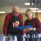 Jim Harre discusses the New World Wine Awards with fellow judge Kate Radburnd. Photo supplied.
