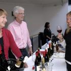 Joan and Tony Lawrence of Aurum Wines, Cromwell talk with Denny Downie, of Desert Heart ,...