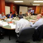 Joe Butterfield (left) chairs his first meeting of the Southern District Health Board. Photo by...
