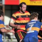 Joe Latta (Zingari-Richmond) in action against Taieri at  Montecillo last Saturday. Also pictured...