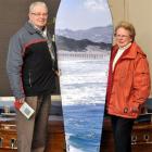 John and Maureen Banks inspect one of the caskets on display at Dignity Funeral Services' casket...