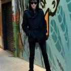 John Cooper Clarke poses in an alley across the road from the Robbie Burns statue in Dunedin...