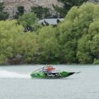 John Derry crosses the finish line  at Cromwell yesterday to win the World Jet Boat Marathon....