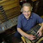 Printer Dr John Holmes shows some of the huge collection of letters at his Dunedin workshop. His...