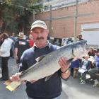 John Jamieson shows off the 6kg salmon he pulled from Otago Harbour yesterday to win the Otago...