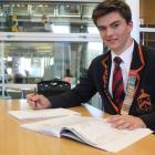 John McGlashan College pupil Ed Davies (17) brushes up on  biology  before his Cambridge...
