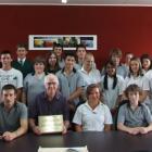 John Rawson (front centre) with the East Otago High School pupil council in the meeting room...