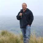 Johnny Bell addresses the crowd at a field day at Shag Valley Station last week. Photo by Sally Rae.