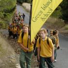 Joshua Sutherland (10, left) and Jimmy Lodge (10) led the group yesterday on a hike to the site...