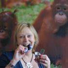 Judith Curran, of Dunedin, celebrates victory in the campaign to rid Cadbury dairy milk chocolate...