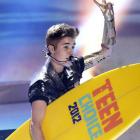Justin Bieber symbolically accepts four awards at the 2012 Teen Choice Awards at the Gibson...