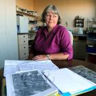 Kaikorai resident Diane Yeldon with paperwork she has collected while trying to find who is...