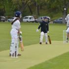 Kaikorai Sonics bowler Jackson Milne sends down a delivery to Taieri Sparkles batsman Grace...
