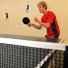 Kaikorai Valley College pupil Blake Porteous (15) perfects his table tennis serve during the...