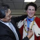 Kaikorai Valley High School pupil Joel Bartlett tries on the mayoral robes with Dunedin Mayor...