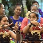 Kakala Pole (left, 8) and Stephanie Lihau (9), both of Dunedin, were part of the official welcome...