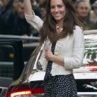 Kate Middleton waves to the crowds gathered outside the Goring Hotel in London on the eve of her...