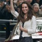 Kate Middleton waves to the crowds gathered outside the Goring Hotel in London yesterday ahead of...