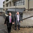 Kavanagh College principal Paul Ferris (right) shows his replacement, Tracy O'Brien, around the...