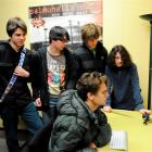 Kavanagh College pupils and members of the band John George MacLeod's Melon Platoon (from left)...