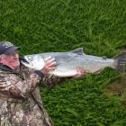 Keen salmon angler Kevin Coutts, of Dunedin, with the 9.57kg salmon he caught "somewhere in the...