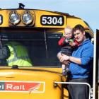 Keiran Harper and his son Oliver (20 months) aboard KiwiRail's exhibition express,  which visited...