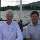 Ken Urquhart (left) and Chris Conroy with some of the A-class catamarans that will be sailed at...