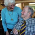 Kevin and Brida Dowling, of Ophir, share a moment of celebration after being made life members of...