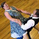 Kevin and Derelle Polaschek, of Christchurch, flaunt their moves in the senior masters final of...